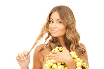 Image showing lovely woman with green apples