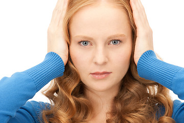 Image showing woman with hands on ears