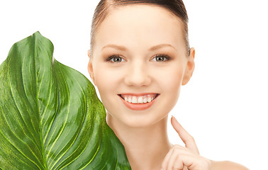 Image showing woman with green leaf