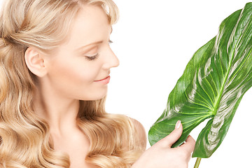 Image showing woman with green leaf