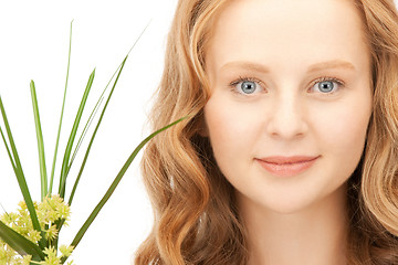 Image showing woman with green sprout