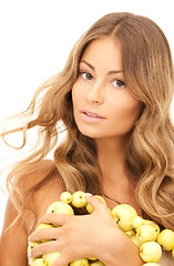 Image showing lovely woman with green apples