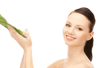 Image showing woman with green leaf