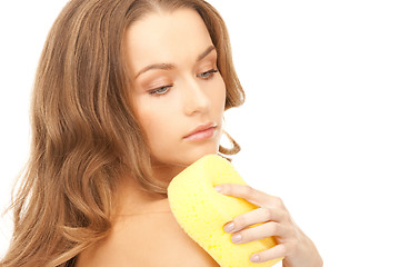 Image showing beautiful woman with sponge