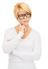 Image showing pensive businesswoman over white