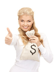 Image showing woman with dollar signed bag