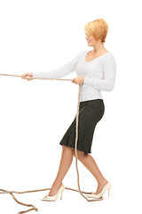 Image showing business woman pulling rope