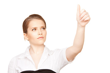 Image showing businesswoman working with something imaginary