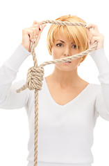 Image showing business woman with the noose