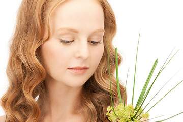 Image showing woman with green sprout