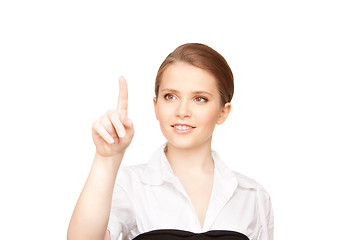 Image showing businesswoman working with something imaginary