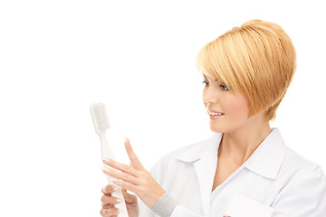 Image showing doctor with toothbrush