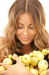 Image showing lovely woman with green apples