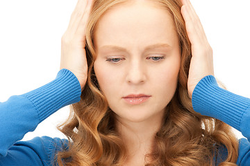 Image showing woman with hands on ears