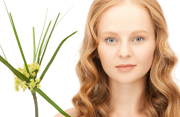 Image showing woman with green sprout