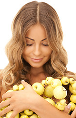 Image showing lovely woman with green apples