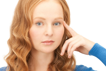 Image showing pensive businesswoman over white