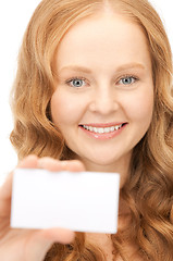 Image showing happy woman with business card