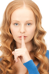 Image showing finger on lips