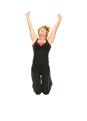 Image showing jumping fitness instructor