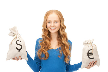 Image showing woman with euro and dollar bags