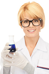 Image showing lab worker holding up test tube