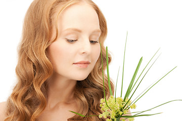 Image showing woman with green sprout