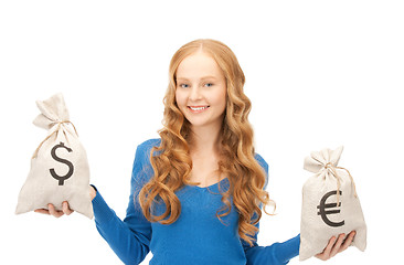 Image showing woman with euro and dollar bags