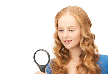 Image showing woman with magnifying glass