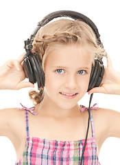 Image showing happy girl in big headphones