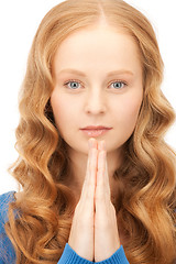 Image showing praying businesswoman