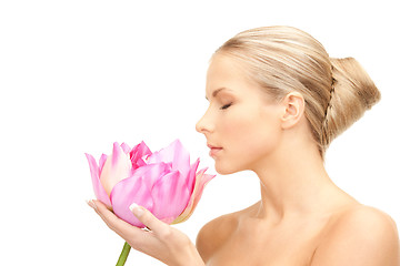 Image showing beautiful woman with white flower