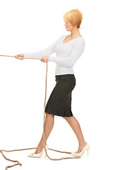 Image showing business woman pulling rope