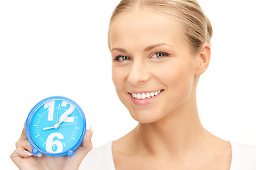 Image showing woman holding alarm clock