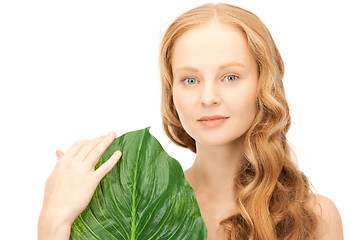 Image showing woman with green leaf