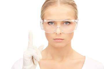 Image showing woman in protective glasses and gloves