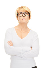 Image showing pensive businesswoman over white