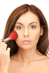 Image showing lovely woman with brush