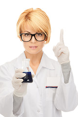 Image showing lab worker holding up test tube