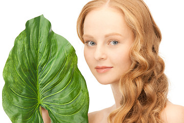 Image showing woman with green leaf