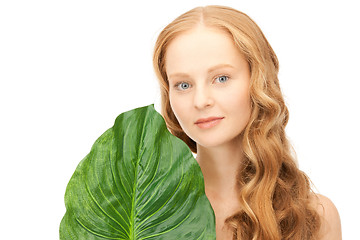 Image showing woman with green leaf