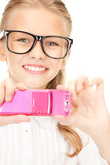 Image showing happy girl taking picture with cell phone