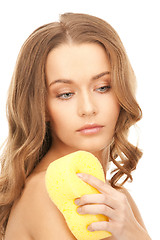 Image showing beautiful woman with sponge