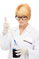 Image showing lab worker holding up test tube