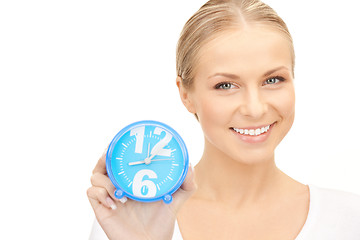 Image showing woman holding alarm clock