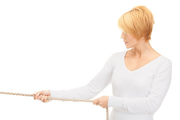 Image showing business woman pulling rope