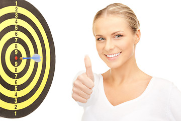 Image showing businesswoman with dart and target