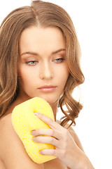 Image showing beautiful woman with sponge