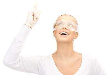 Image showing woman in protective glasses and gloves