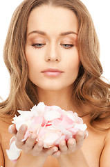 Image showing beautiful woman with rose petals